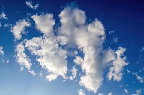 White clouds on blue sky Stock Photos