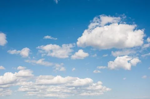 White clouds in a blue sky Stock Photos