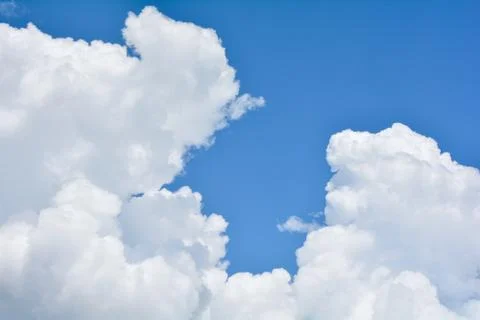White clouds with a blue sky Stock Photos