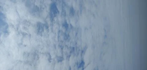 White clouds in the blue sky Stock Photos