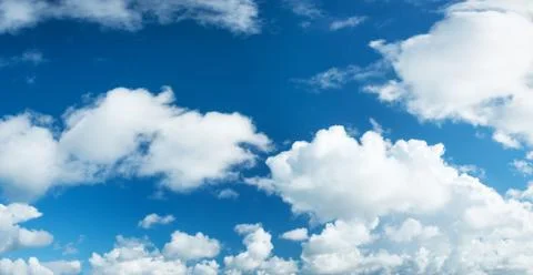 White clouds on blue sky Stock Photos