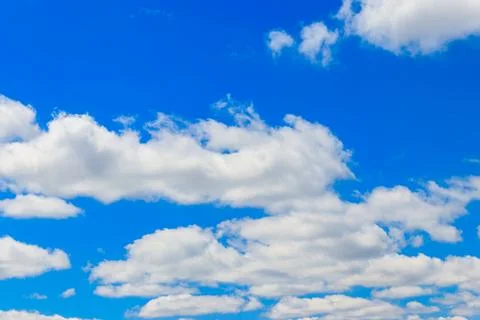 White clouds in blue sky Stock Photos