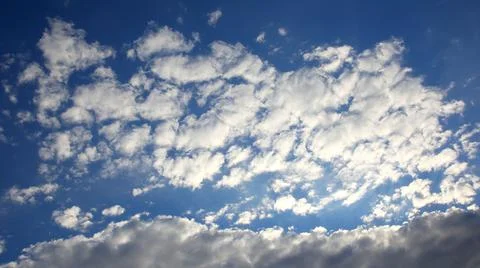 White clouds in the blue sky Stock Photos