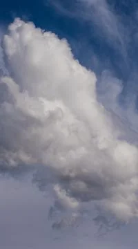 White clouds in a blue sky Stock Photos