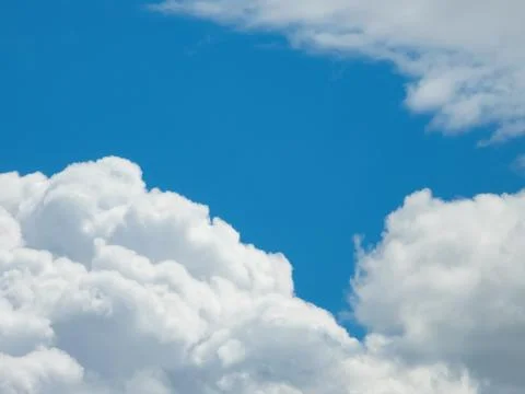 White clouds on a blue sky Stock Photos