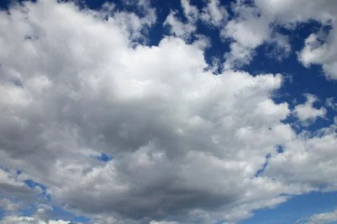 White clouds in a blue sky Stock Photos