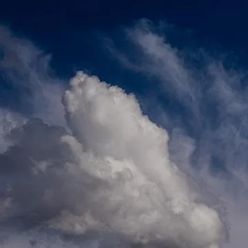 White clouds in a blue sky Foto stock