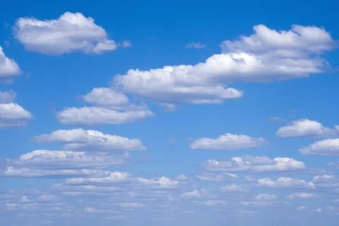 White clouds, blue sky Stock Photos