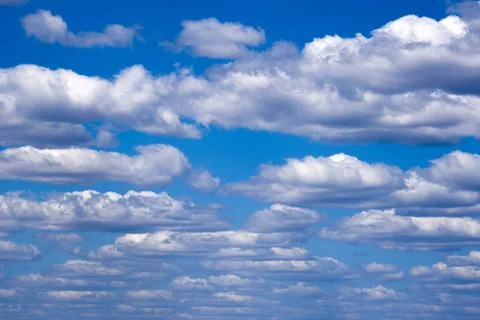 White clouds, blue sky Stock Photos