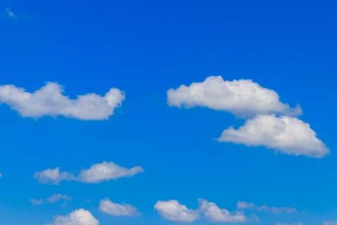 White clouds in blue sky Stock Photos