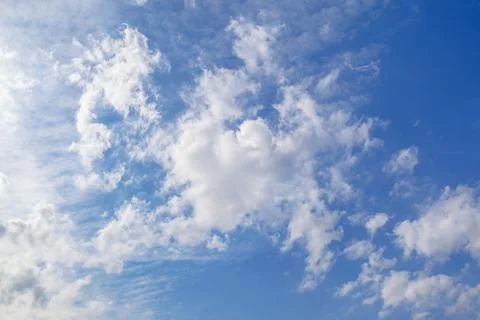 White clouds in blue sky Stock Photos