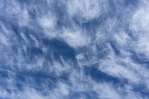 White clouds on a blue sky Stock Photos