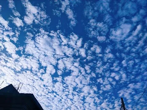 White clouds blue sky Stock Photos