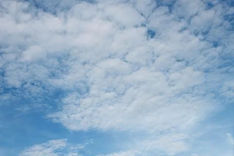 White Clouds on the blue sky Stock Photos