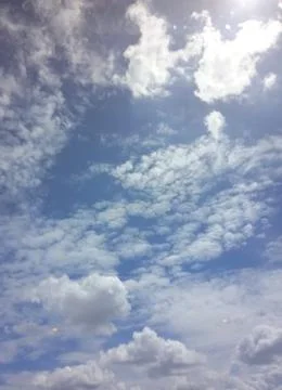White clouds in the blue sky Stock Photos