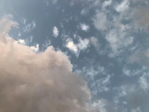 The white clouds with the blue sky Stock Photos
