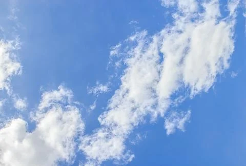 White clouds in the blue sky Stock Photos