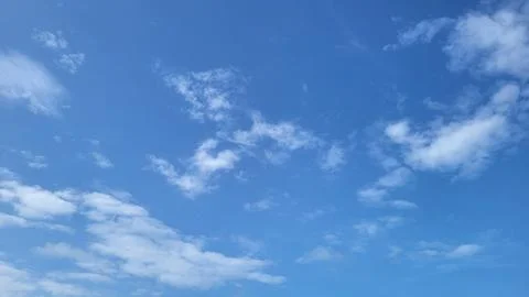 White clouds in a blue sky. Stock Photos
