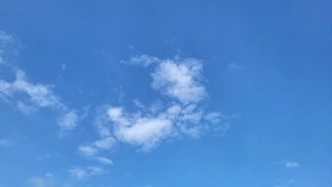 White clouds in a blue sky. Stock Photos