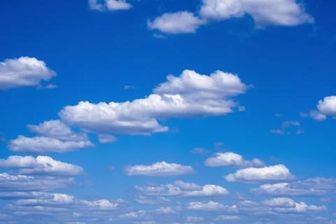 White clouds, blue sky Stock Photos