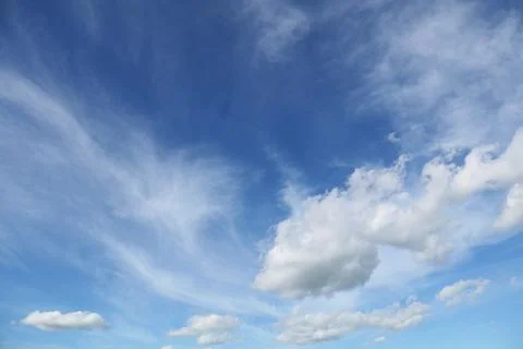 White clouds in blue sky Stock Photos