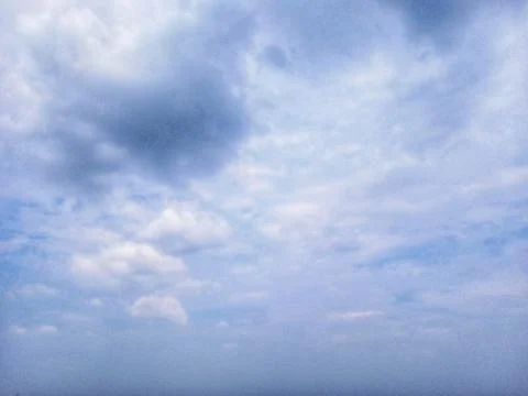 White clouds in the blue sky Stock Photos
