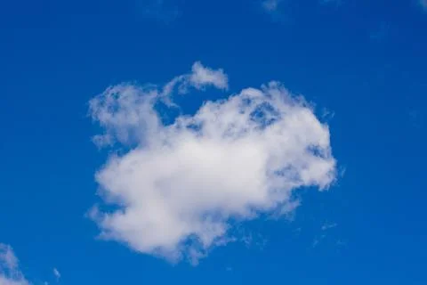 White clouds in a blue sky Stock Photos
