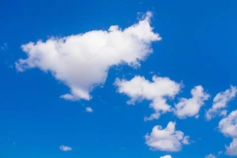 White clouds in a blue sky Stock Photos