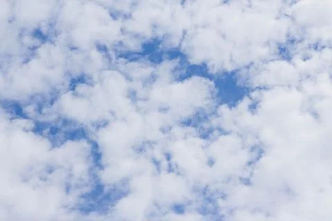 White clouds in the blue sky Stock Photos