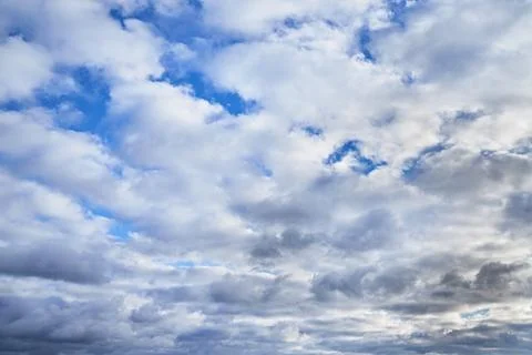 White clouds in the blue sky Stock Photos
