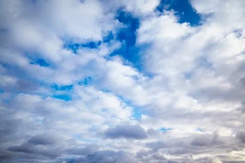 White clouds in the blue sky Stock Photos