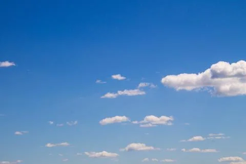 White clouds in blue sky Stock Photos