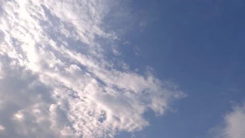 White clouds on blue sky, shot from directly below Video stock 153849578