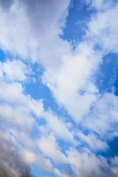 White clouds in the blue sky, sky with clouds, flying clouds in the sky Stock Photos