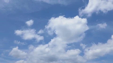 White Clouds in a Blue Sky (slow time lapse) Video stock 113318413