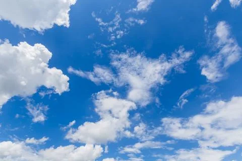 White clouds in the blue sky with space Stock Photos