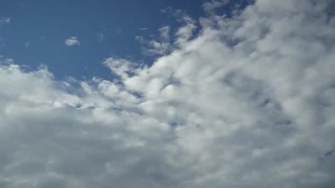 White clouds with blue sky in sunny hot summer weather Stock Footage 338253079