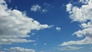White Clouds On Blue Sky. Time-Lapse Motion Background 1080P Stock Footage
