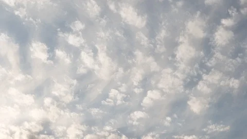 White Clouds in a Blue Sky (time lapse) Stock Footage 123421527