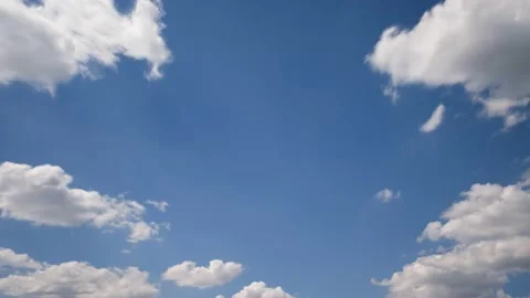 White clouds in blue sky time lapse Stock Footage 136952973