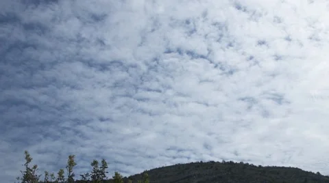 White clouds on the blue sky timelapse Video stock 42306190