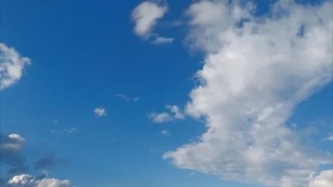 White Clouds In a Blue Sky Timelapse Stock Footage 79815039