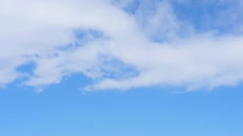 White Clouds in a Blue Sky (x4 time lapse) Stock Footage 103187300