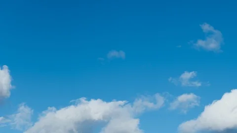 White Clouds in a Blues Sky (time lapse) Stock Footage 122093869