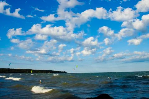White clouds in bright blue sky Stock Photos