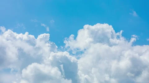 White clouds change shapes on the blue sky. Stock Footage 166249220