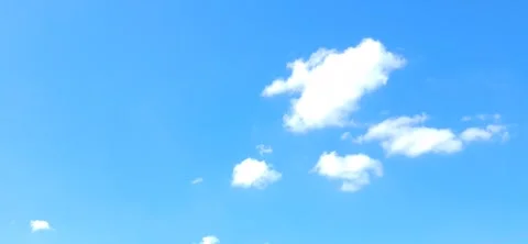 White Clouds in Clear Blue Sky 動画素材 335084450
