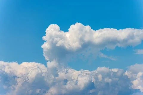 White Clouds in a Clear Blue Sky - Cumulonimbus Stock Photos