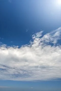 The white clouds on the clear blue sky. No land image. Stock Photos