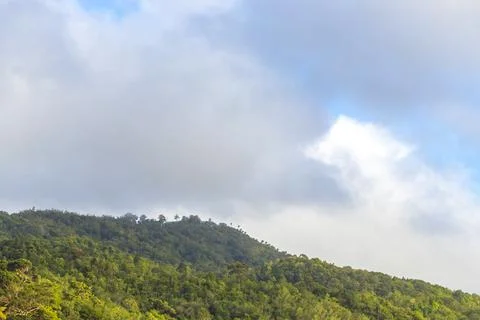 White Clouds Covering Blue Sky Above Green Tropical Mountain Hills Thailand. Stock Photos
